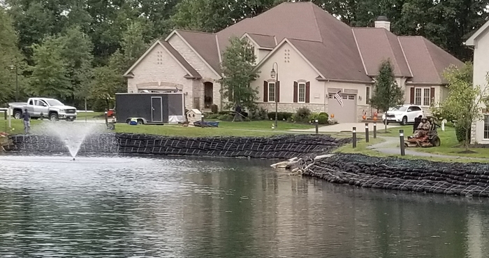 Bank stabilization along edge of a pond.