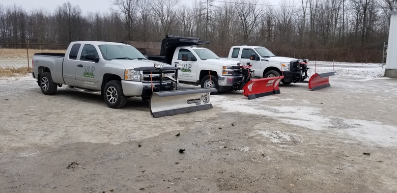 Three snow plows ready for winter.